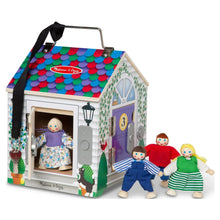 Wooden take-along dollhouse with open door and four poseable cloth dolls
