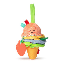 Clip-on ice cream plush toy with peach scoop, layered scoops, green ribbon, and teether