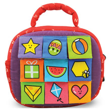 Two-sided Take-Along activity bag with square fabric panels and shape-themed blocks