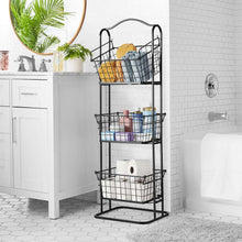 3-tier standing black wire basket with three shelves, holding toiletry and pantry items