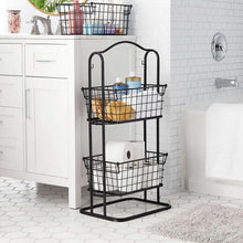 3-tier standing black wire basket with rounded top, holding paper towels and pantry items