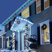 Blue LED C6 string lights along house roofline