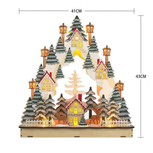 Pre-lit village holiday scene decoration, 41 cm wide x 43 cm high, with glowing houses