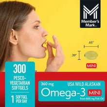 Omega-3 mini softgel capsule being taken, with 360 mg product label