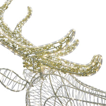 Pre-lit buck yard decoration close-up with curved antlers and gold light strands