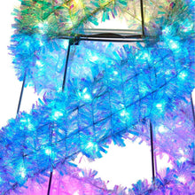 Pre-lit iridescent spiral tree lights, dense multicolor tinsel and fiber strands