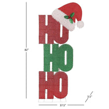 Pre-lit stacked letter décor with Santa hat; 82 in height, red and green LEDs