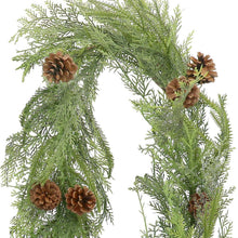Cypress garland with green needles and pinecones on branches