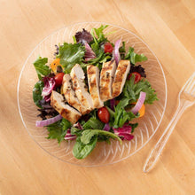 Clear plastic plate with sliced chicken and mixed greens, round 9-inch