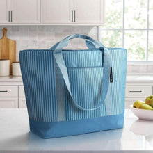 Blue striped insulated tote bag with dual handles and side label