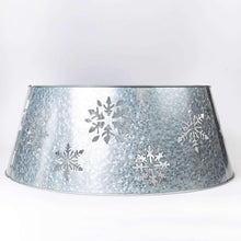 Galvanized metal tree collar with wide band and snowflake cutout pattern