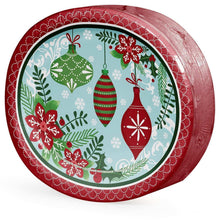 Oval holiday paper plate with red border and ornament pattern, angled view