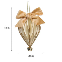 Hanging bell ornament with beige bow, striped fabric, and gold cap