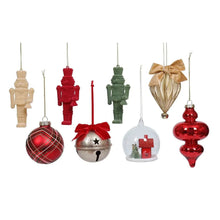 Set of hanging nutcracker and bauble ornaments in red, green, and beige