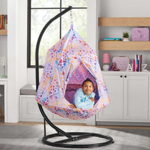 Kids hanging cozy pod with heart-pattern fabric, suspended on a curved black stand