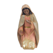 Nativity set carved queen figurine holding a small gold item, pink robe
