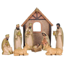Nativity set stable with surrounding figurines, wooden brown and gold details