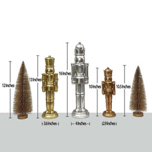Nutcracker decor set showing nutcrackers and mini pine trees in different heights