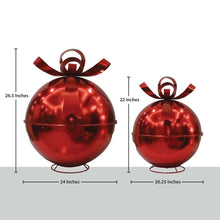Red oversized jingle bell ornaments, set of 2, with ribbon bows and black face cutouts