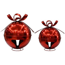 Red metal jingle bell ornaments, set of 2, each with ribbon bow and black smiling face