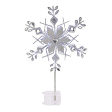 Silver snowflake tree topper on a vertical stem with clear light base
