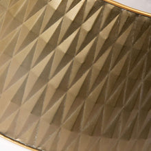 Faceted gold metal tree collar with raised diamond pattern and brass-toned edge