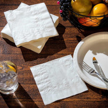 Stack of white premium 2-ply napkins for a table setting