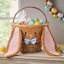 Woven bunny Easter basket with brown handle, plush ears, and blue bow face