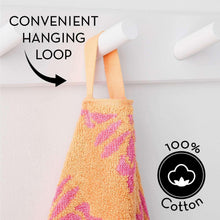 Fashion beach towel with woven hanging loop and bright yellow, pink, purple floral pattern