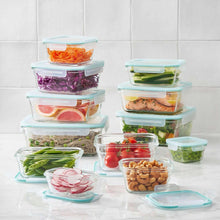 Glass food storage containers with airtight lids, clear and colored contents