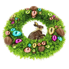 Green tinsel wreath with chocolate-style bunny center and assorted metallic bauble ornaments