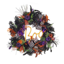 Halloween wreath with glowing yellow 'Boo' sign and multicolor holiday lights and ribbons