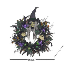 Pre-lit witch wreath, 26 in diameter, with glowing green face and purple lights