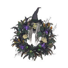 Pre-lit witch wreath featuring glowing witch face, purple bulbs, and black garland