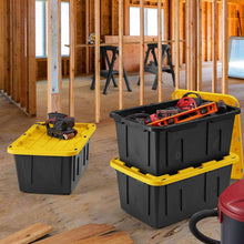 Black and yellow storage tote with yellow lid, holding tools and supplies