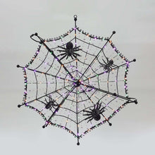 Pre-lit black spiderweb with four spiders and purple LED lights