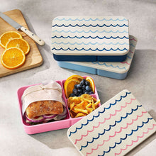 Snack bento box with blue wave-pattern lid, teal base, and divided compartments