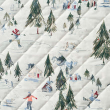 Printed velvet fabric close-up, white with pine trees and skiers pattern