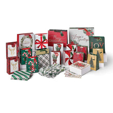 Holiday gift bag and box set with red, green patterned designs and bows