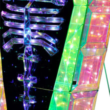 Close-up of pre-lit coffin interior LEDs with glowing skeleton ribcage and arms