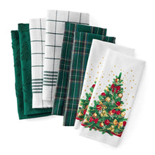 Holiday kitchen towel with colorful Christmas tree illustration and gold star accents, green border