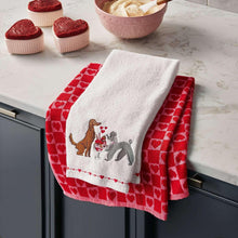 Kitchen towel with white background, dog and mouse print, red patterned border