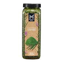 Chopped chives seasoning jar with green chopped herb contents and black cap