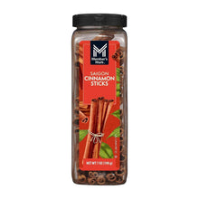 Cinnamon stick jar with tied Saigon cinnamon sticks in clear container, black lid