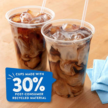 Two clear plastic cups filled with iced drinks