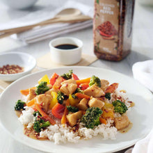 Crushed red pepper dish: white rice topped with vegetables and diced chicken