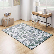 Teen area rug with multicolor camouflage pattern, rectangular border