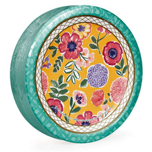Round floral paper plate with teal outer rim and multicolor blossoms