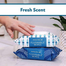 Flushable wipes pouches, fresh scent, blue-and-white patterned packs stacked