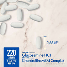 Glucosamine HCl and chondroitin/MSM complex tablets, oval white tablets on light surface